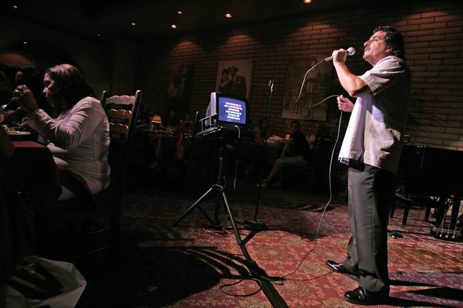 LAS VEGAS -- July 17, 2006 -- John Garafalo sings during karaoke night at the Bootlegger Bistro at 7700 Las Vegas Blvd., South. Garafalo, a hopeful opera singer, left New York to pursue a dream to sing in Las Vegas. R. MARSH STARKS / LAS VEGAS SUN